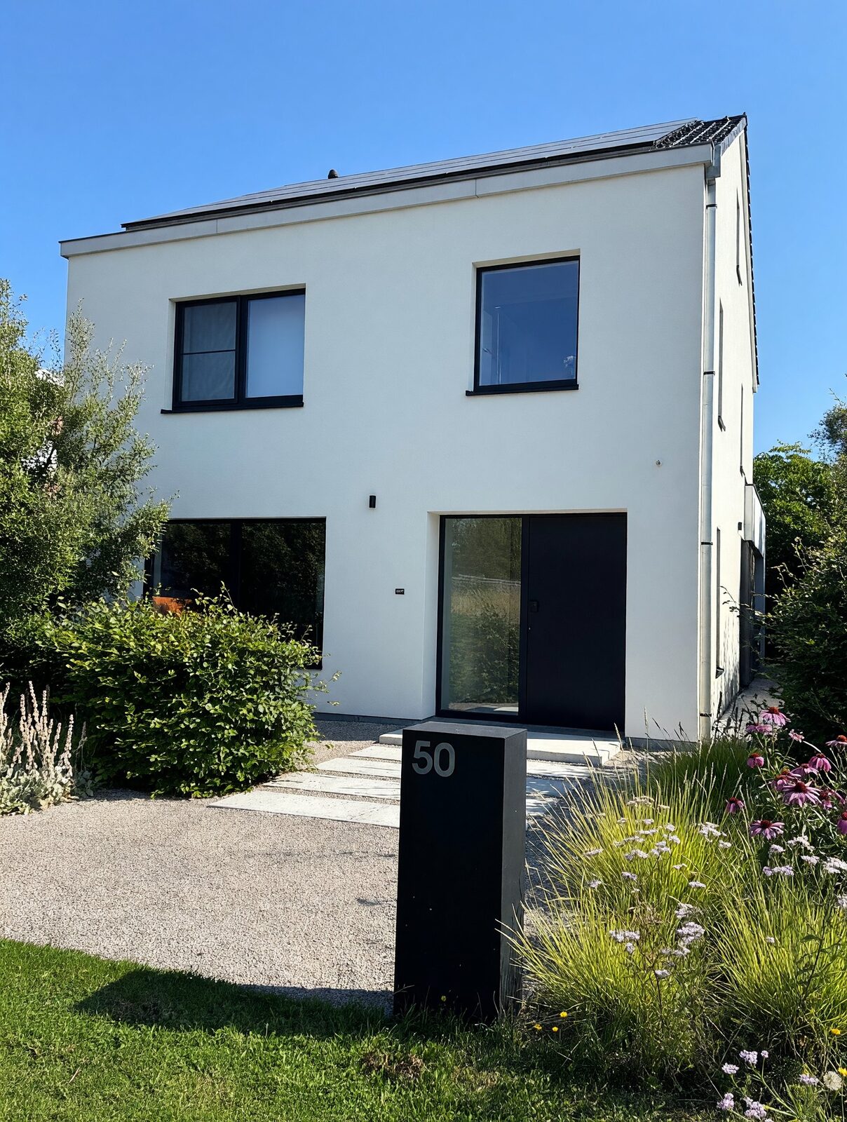 Crepi Care reiniging moderne villa West-Vlaanderen softwash voor na